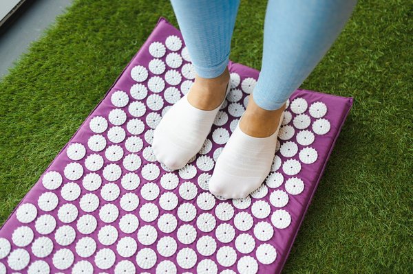Découvrez les bienfaits thérapeutiques du tapis d'acupression pour votre bien-être